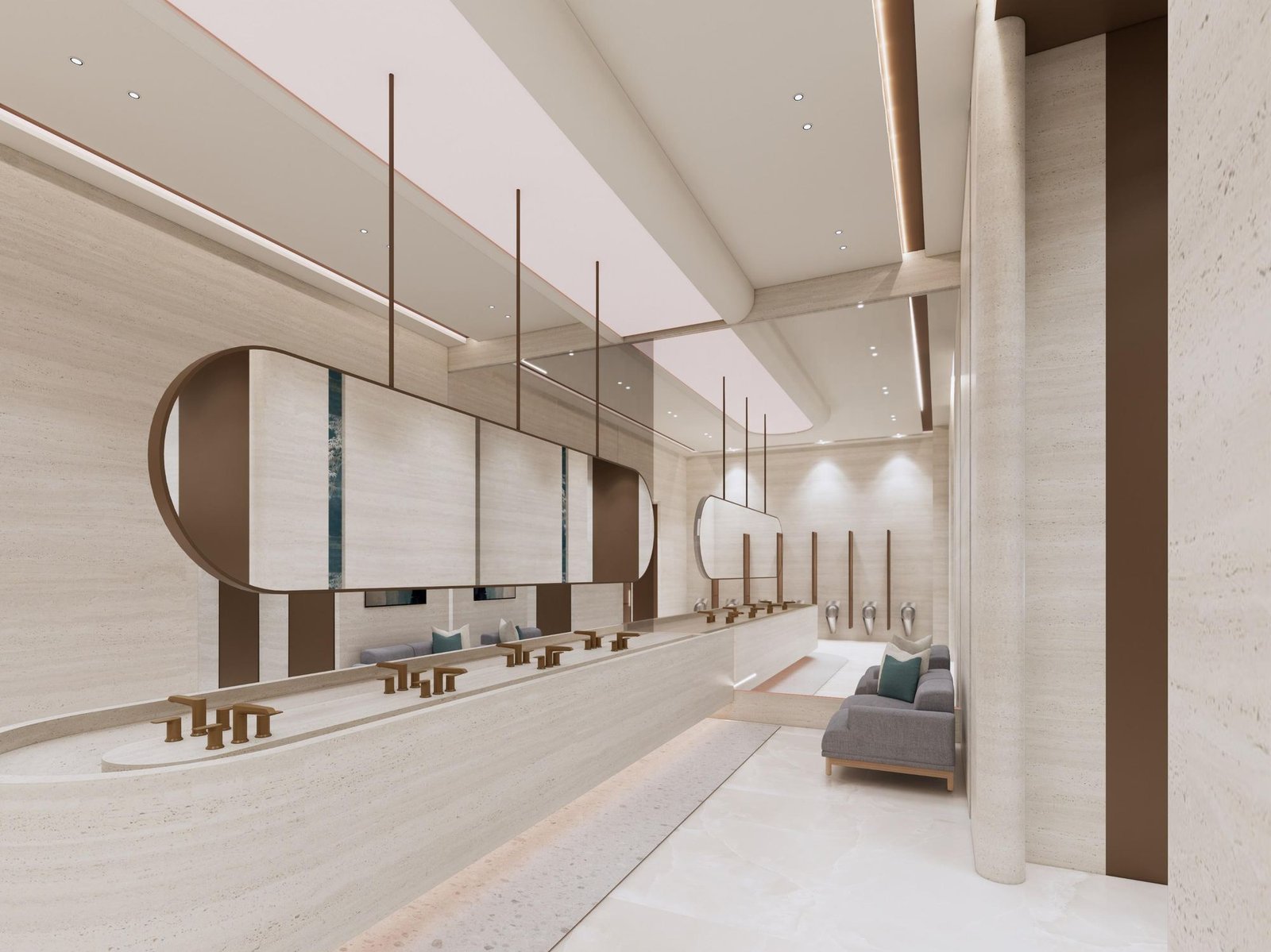 A long travertine counter under a floating pill-shaped mirror on brass rods, a sofa beyond