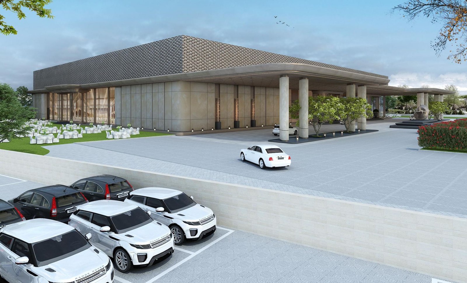 Cars parked in marked bays beside the convention building